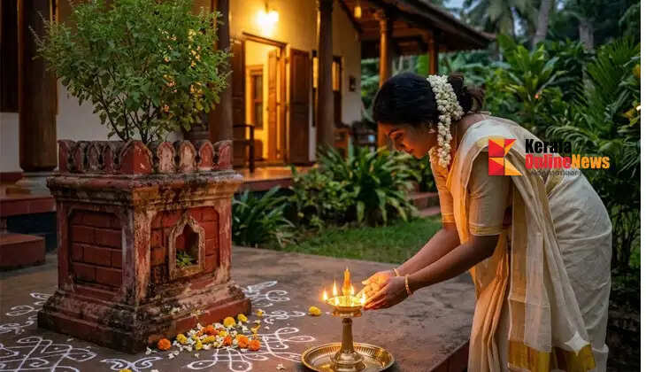 Why is an evening lamp lit in front of the *thulasithara* (the raised platform for the holy basil plant)?