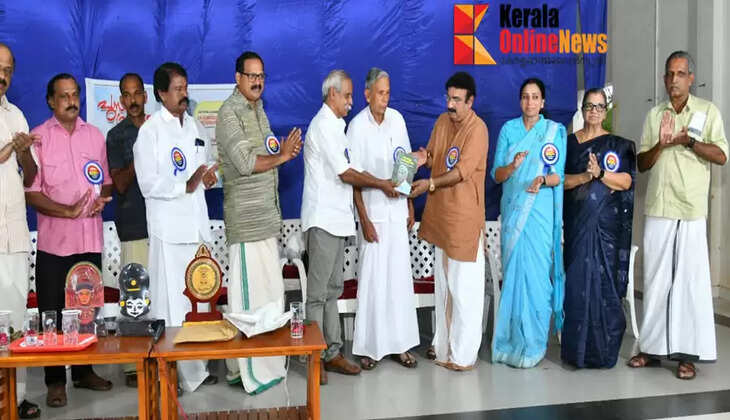 Retired teacher M.V. Govindan's book 'Paths of Memory' released