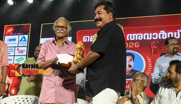 Sreekumaran Thampi presented the May Day Award to K. Pramod.
