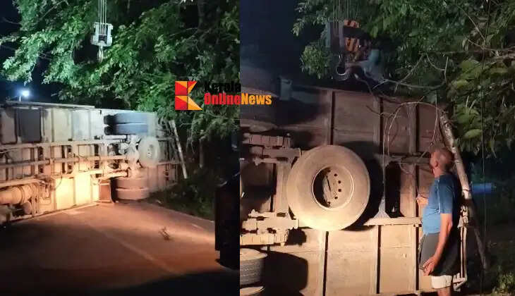 Traffic was disrupted on the Taliparamba-Ninisherikadavu road after a container lorry overturned.