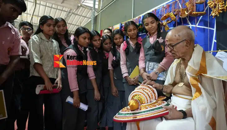 A group of children gets a first-hand introduction to the art of Kathakali at the premises of the Muzhakkunnu Mridangashaileswari Temple.