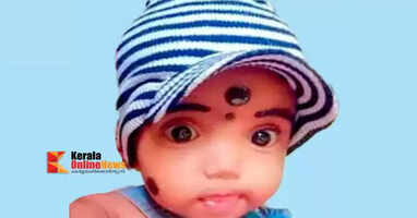 The baby was admitted to Nilambur District Hospital with high fever and vomiting; the mother, who had been waiting to see the doctor, found the baby dead in her arms.