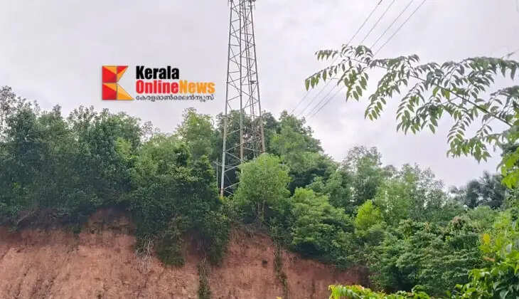 A mobile tower installed after a hillside was cut away at Periya is now at risk of collapse