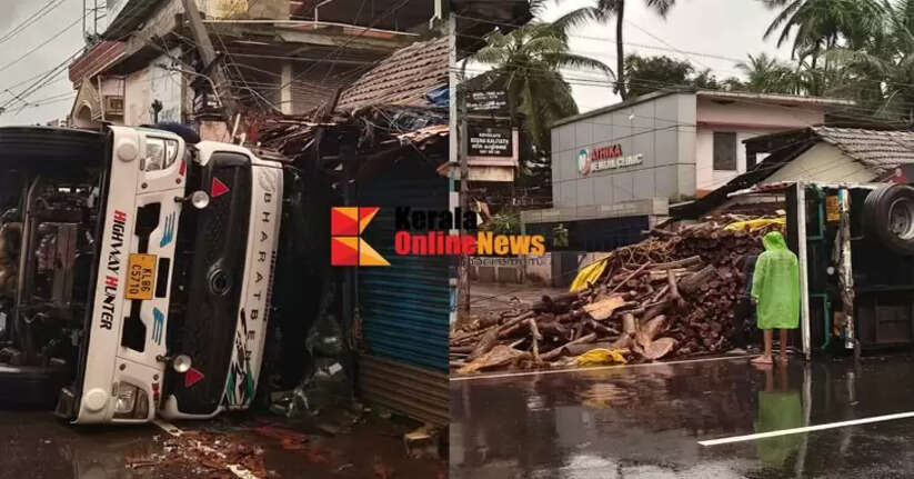 A lorry overturned after going out of control at Venus Junction in Thalassery; three shops, a bus stand and an electricity pole were damaged.