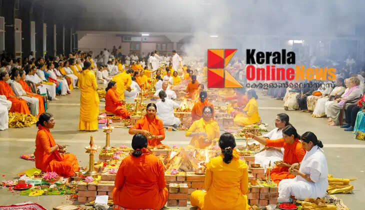 Amritapuri on the occasion of Guru Purnima; Mata Amritanandamayi says that the duty of the Guru is to elevate the human mind from the state of 'I' to the state of 'we'