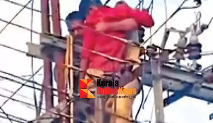 Wife upset; Young man threatens suicide by climbing on top of transformer in front of wife's house