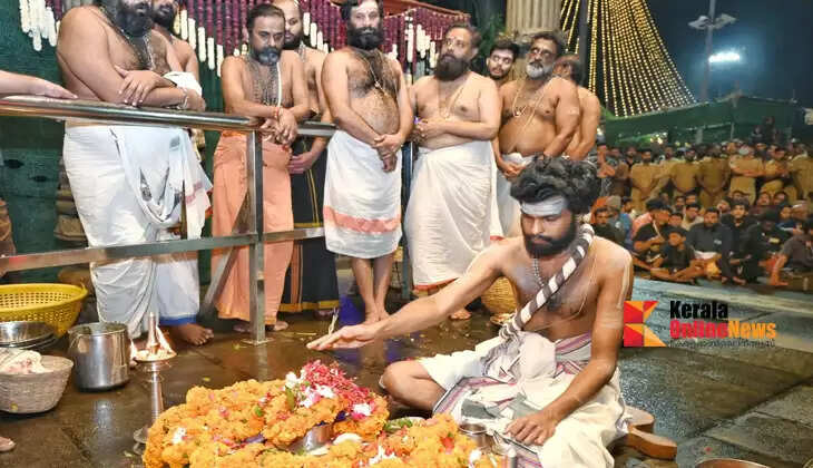 Padi Pooja at the 18th step of the Sannidhanam temple, offering prayers to devotees