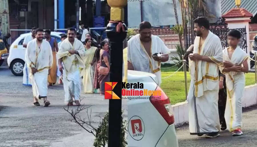 Chief Minister pinarayi vijayan son Vivek Kiran seeks darshan at Guruvayur temple