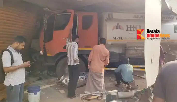 A petrol tanker lorry crashed into a shop at Thana, Kannur; a major disaster was narrowly averted.