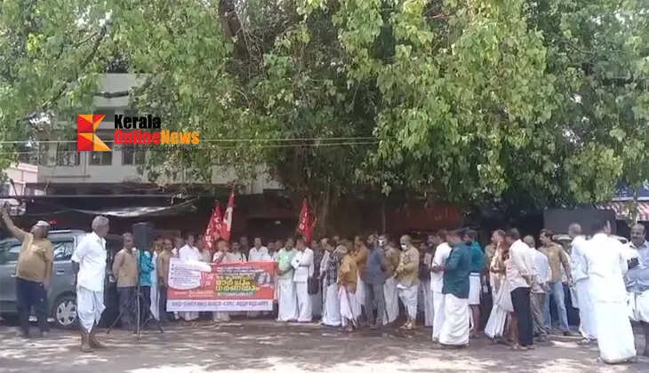 Motor vehicle workers staged a protest in front of Kannur RS Post Office against the fuel price hike.