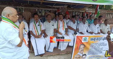 A march and dharna were held in Kannur to protest against the increase in lottery ticket prices