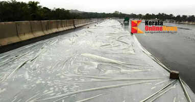 A trick to hide cracks: Cover the tar-filled area of ​​the national highway in Pilathara, Payyannur with a plastic sheet