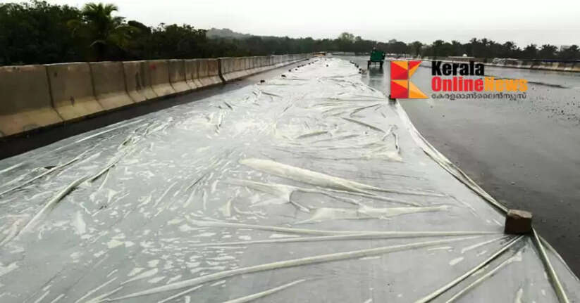 A trick to hide cracks: Cover the tar-filled area of ​​the national highway in Pilathara, Payyannur with a plastic sheet