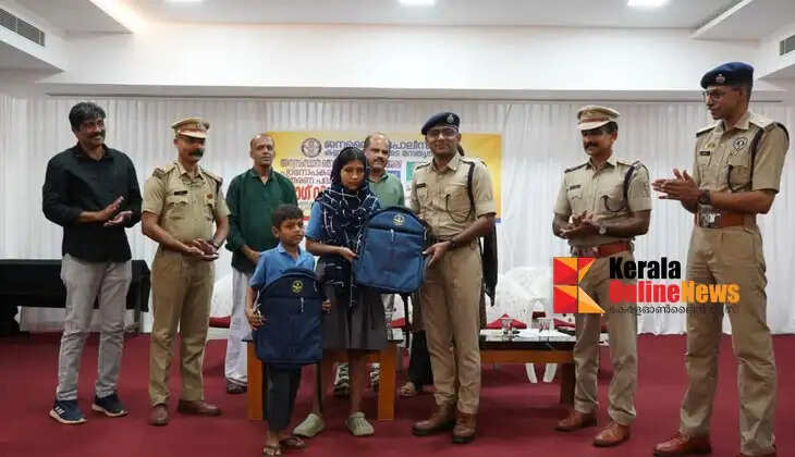 Kannur City Janamaithri Police&rsquo;s Migrant Labour Safety Scheme: School bags distributed to the children of migrant workers.