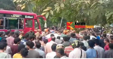 Two people died in a collision between a private bus and a car in Uli, Kannur