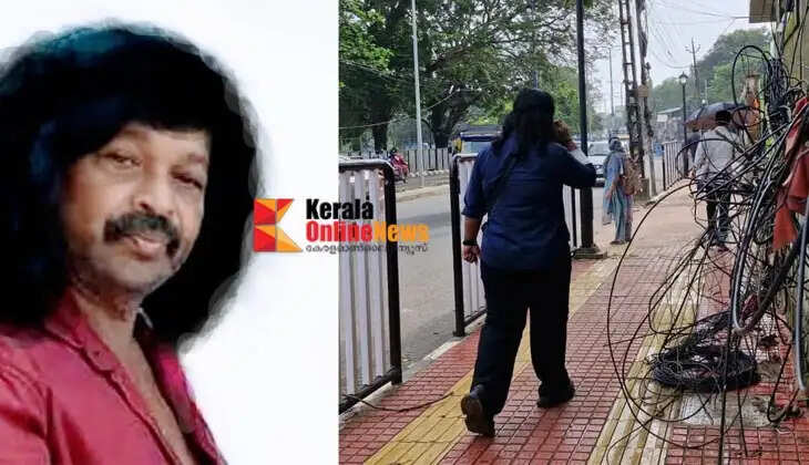 Kannur District Collector warns of action under the Disaster Management Act if cables on the footpath are not removed.