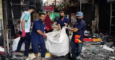 Traders have started cleaning up the Taliparamba KV Complex, where everything was destroyed in the fire.