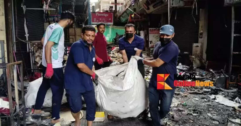 Traders have started cleaning up the Taliparamba KV Complex, where everything was destroyed in the fire.