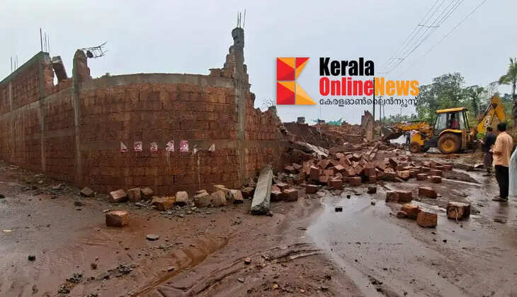 A huge wall collapsed onto the road in Koilode due to heavy rains.