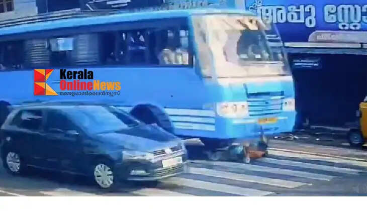 Unbelievable!! Housewife beats death; survives after being run over by private bus in Kollam