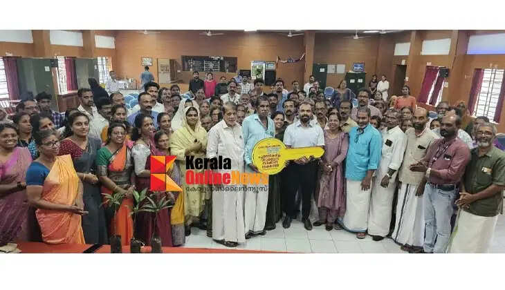 The handing over of keys for Pradhan Mantri Awas Yojana houses took place at the Edakkad Block Panchayat.