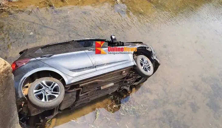 car driven by 14 year old overturns into stream in kannur st