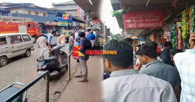 Smoke rising from a clothing store in the heart of Taliparamba city causes panic