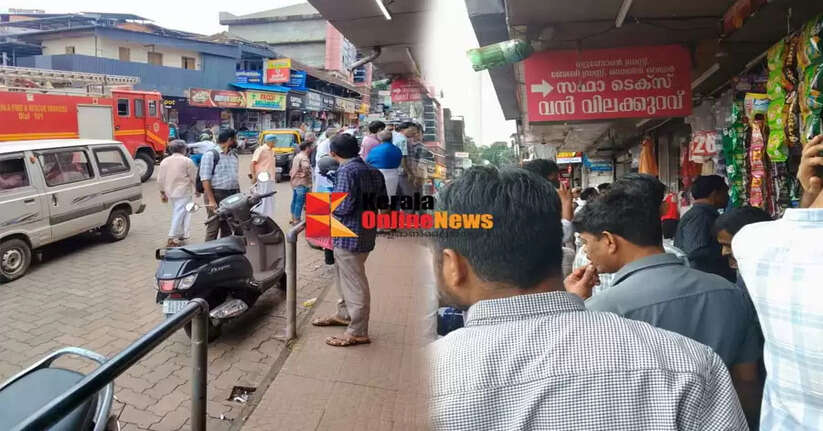 Smoke rising from a clothing store in the heart of Taliparamba city causes panic