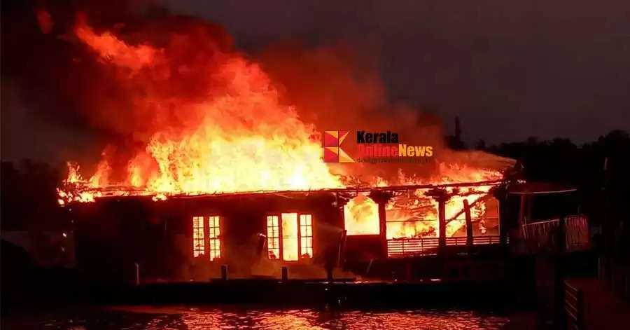 A houseboat caught fire in the river at Kattampalli Kannur