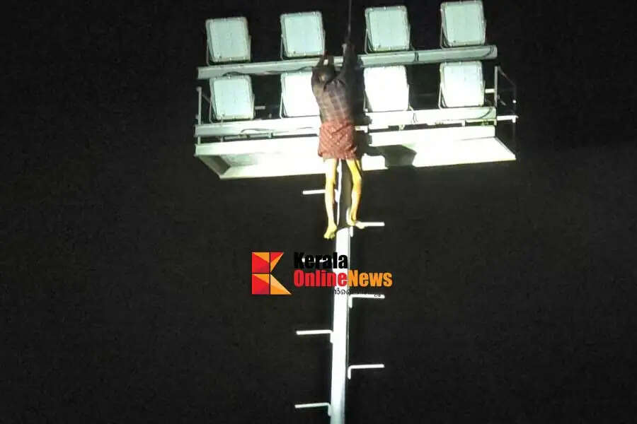 'Ponnu-Sabu-come-down-a-young-man-climbed-on-top-of-the-floodlight-tower-during-a-hunter-event-in-Taliparambil.jpg