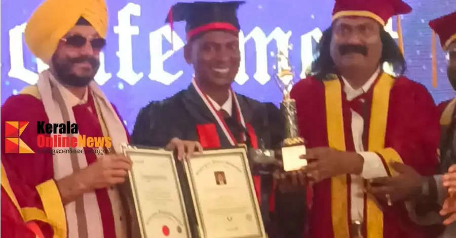 Sea swimmer Charleson Ezhimala was presented with a doctorate