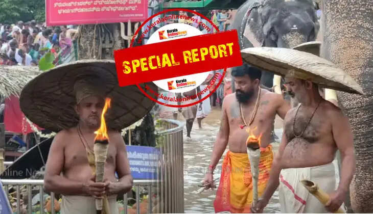The Panthakidgams of Kottiyoor, holding a burning torch in their right hand and a bamboo stick with oil in their left hand.