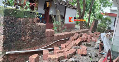 A case has been registered against a neighbor for trespassing and breaking the wall of a house in Kannur
