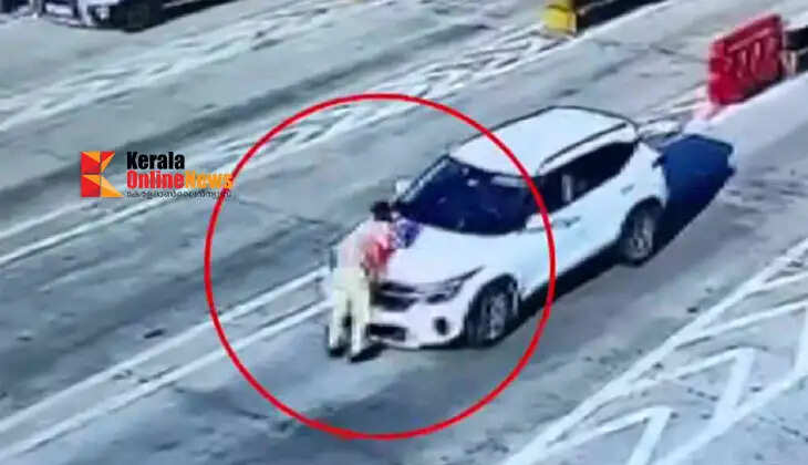 Driver drives dangerously with lifeguard stuck in car's bonnet at Panthirankavu toll plaza; case of attempt to murder filed against driver