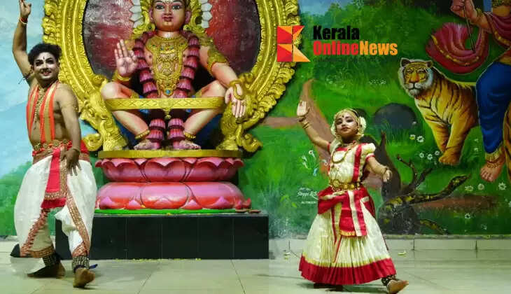 Father and daughter perform a dance in the presence of Lord Ayyappa