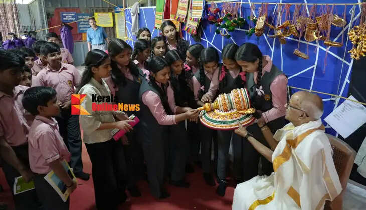 A group of children gets a first-hand introduction to the art of Kathakali at the premises of the Muzhakkunnu Mridangashaileswari Temple.35