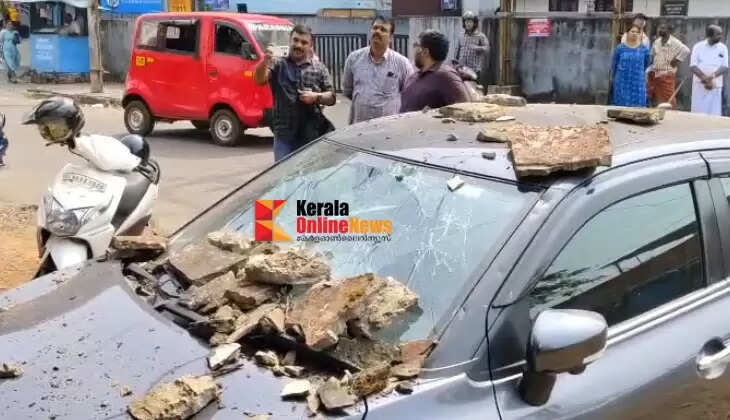 Concrete slab falls on top of car at Kannur Caltex