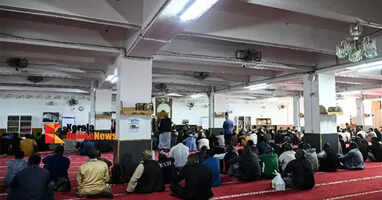 Pig heads outside mosques in Paris, some with the president's family name
