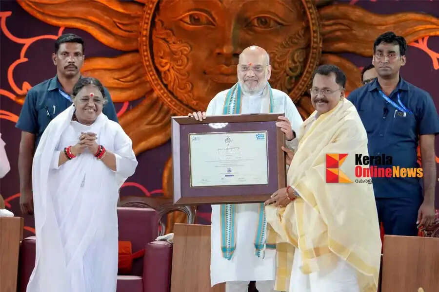 Mata Amritanandamayi Devi life is a stream of selfless service Union Home Minister Amit Shah