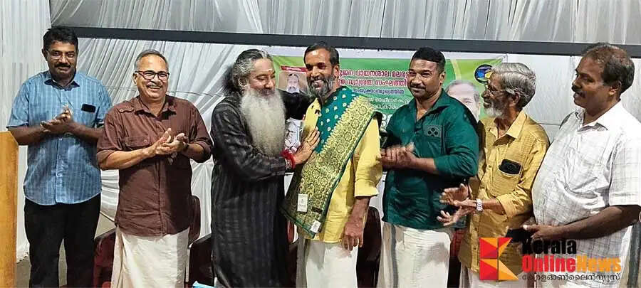 PV Vinod who won the state government Best Village Officer award receives praise from his hometown