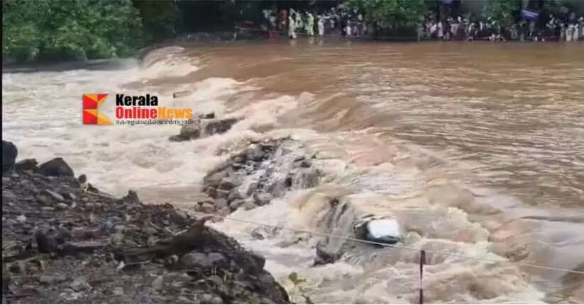 Heavy rain The temporary Footpath at Bavali River in Kottiyoor has collapsed.