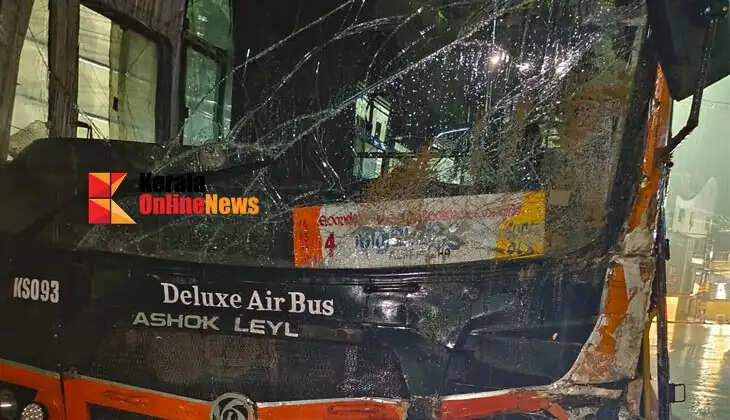 KSRTC Swift bus damaged after being hit by sand lorry