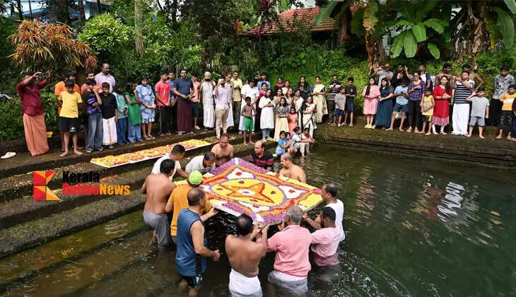 Swimming group creates Onam floral carpet in a pond at Pallikunnu, Kannur; a novel sight that intrigued onlookers.