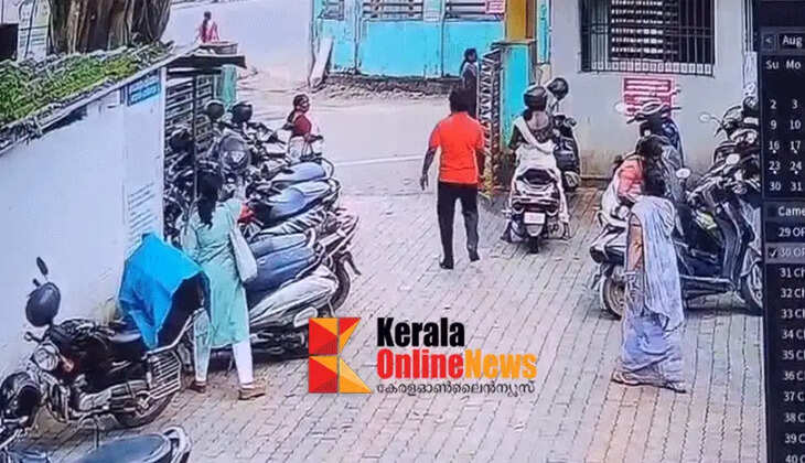 Middle-aged woman steals helmet from Thiruvalla Taluk Hospital premises; CCTV footage shows her returning it